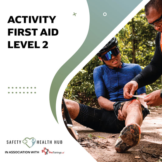 Two people outdoors, one applying first aid to the other's leg with text about activity first aid level 2.