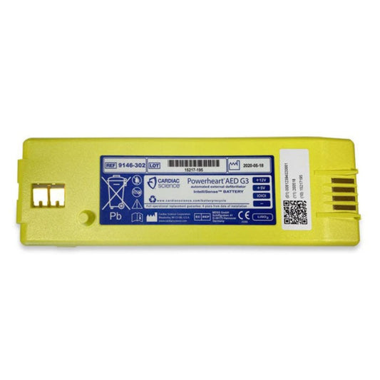 Yellow battery pack with label on a white background